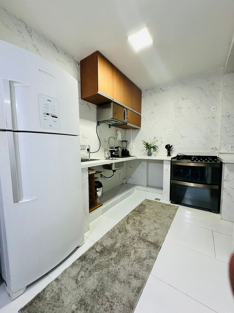 Uma quadra do Reveillon, wi fi, cozinha completa e lavanderi